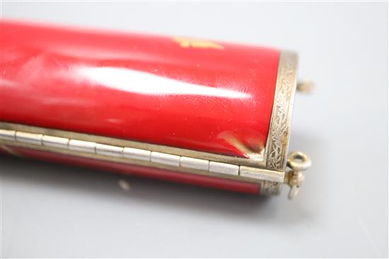 A ladys 1920s silver gilt and gilded red enamelled ovoid minaudiere, import marks for Cohen & Charles, London, 1925, 82mm.
